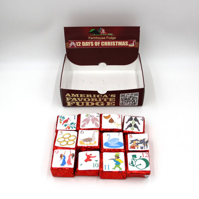 Box of '12 Days of Christmas' fudge with colorful illustrations on a white background