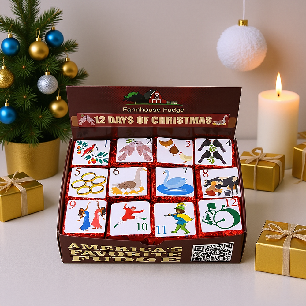 Box of Farmhouse Fudge's '12 Days of Christmas' fudge with decorative Christmas tree and gifts in the background.